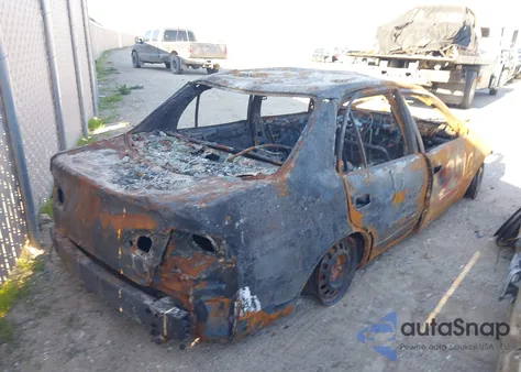 1999 Toyota Corolla Ce из США, поврежденный, VIN 1NXBR12E4XZ178165